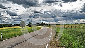 Dramatic Ãâhunder clouds over the road